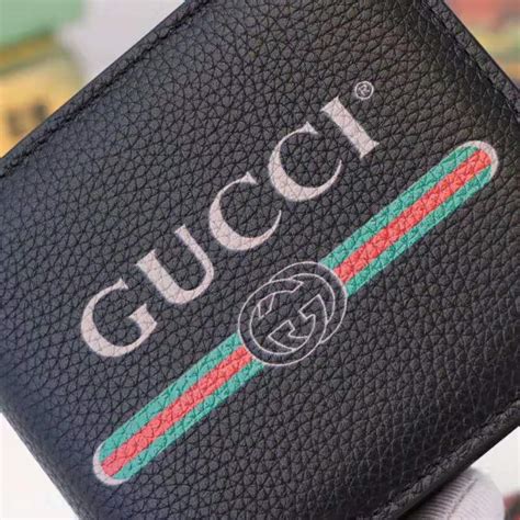 gucci print leather bi-fold wallet